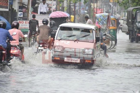 Tripura Urban Development scams continue : Capital City turns into 'garbage-swimming-pool' just after 15 minutes of rain